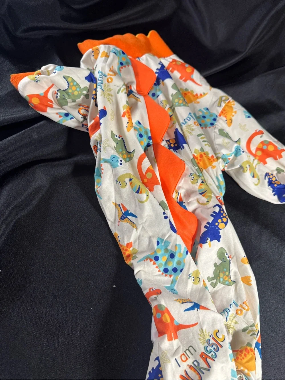 Dinosaur Print Full-Body Dog Pajamas — Orange Trim